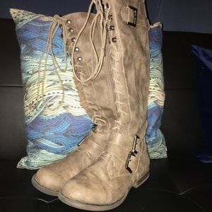 Amex’s knee high boots